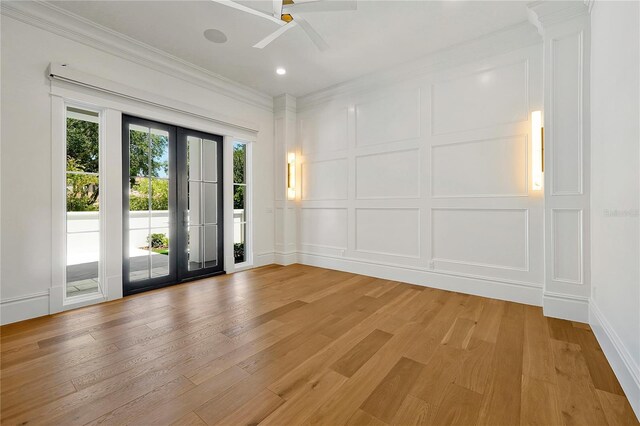 5525 Isleworth Country Club Dr, Windermere, FL 34786 - spare room with a decorative wall, crown molding, light wood-type flooring, ceiling fan, and recessed lighting