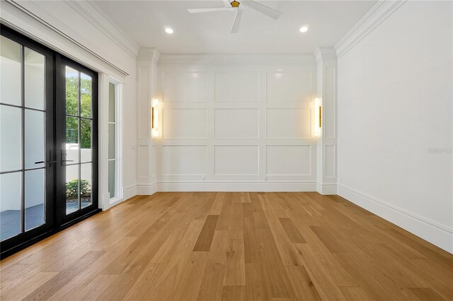 5525 Isleworth Country Club Dr, Windermere, FL 34786 - empty room with light wood finished floors, a decorative wall, crown molding, french doors, and a ceiling fan