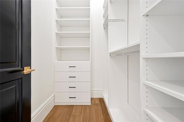 5525 Isleworth Country Club Dr, Windermere, FL 34786 - walk in closet featuring light wood-type flooring