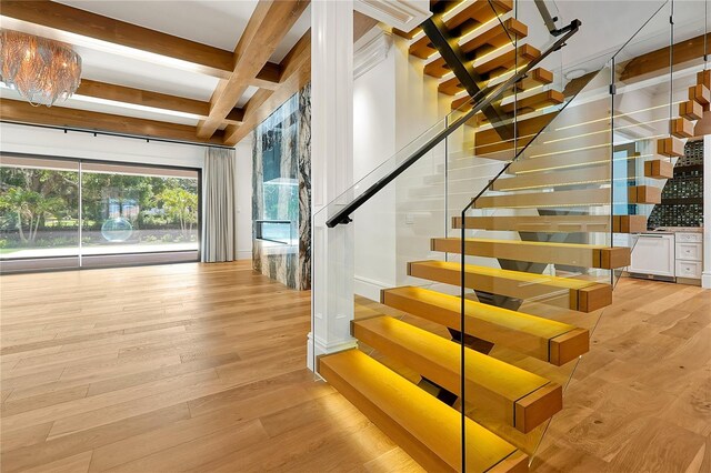 5525 Isleworth Country Club Dr, Windermere, FL 34786 - stairway with coffered ceiling, beam ceiling, and wood finished floors