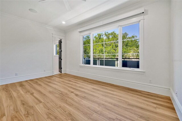 5525 Isleworth Country Club Dr, Windermere, FL 34786 - spare room with light wood-style flooring, crown molding, and baseboards
