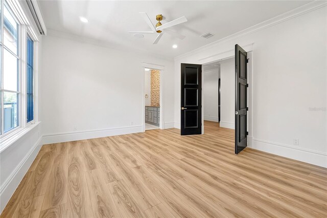 5525 Isleworth Country Club Dr, Windermere, FL 34786 - unfurnished bedroom featuring crown molding, light wood-style flooring, recessed lighting, baseboards, and connected bathroom