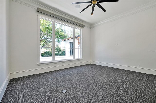 5525 Isleworth Country Club Dr, Windermere, FL 34786 - empty room featuring a ceiling fan, carpet flooring, baseboards, and crown molding