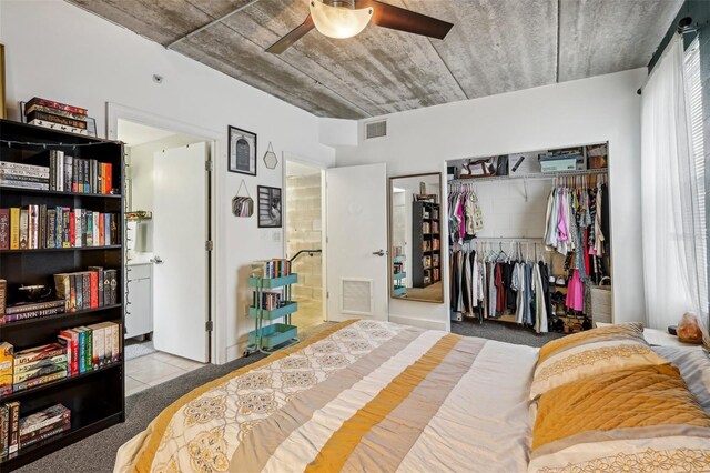 bedroom featuring tile patterned flooring, a ceiling fan, a closet, and visible vents