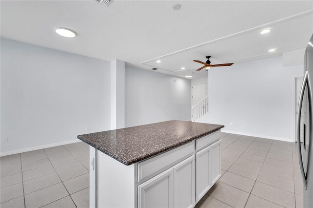 kitchen with recessed lighting, white cabinetry, ceiling fan, and light tile patterned flooring