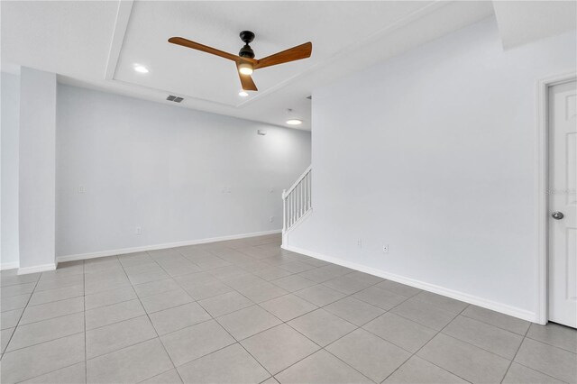 spare room with visible vents, ceiling fan, stairway, recessed lighting, and light tile patterned floors