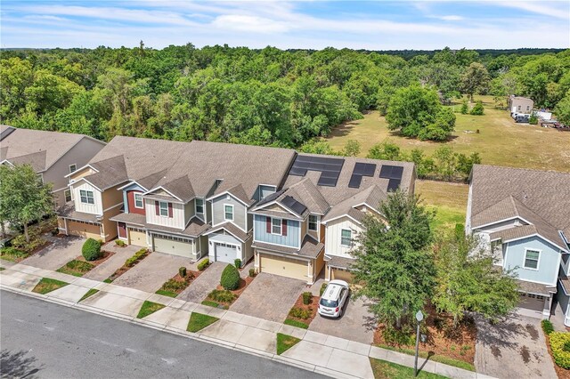 bird's eye view with a residential view and a forest view