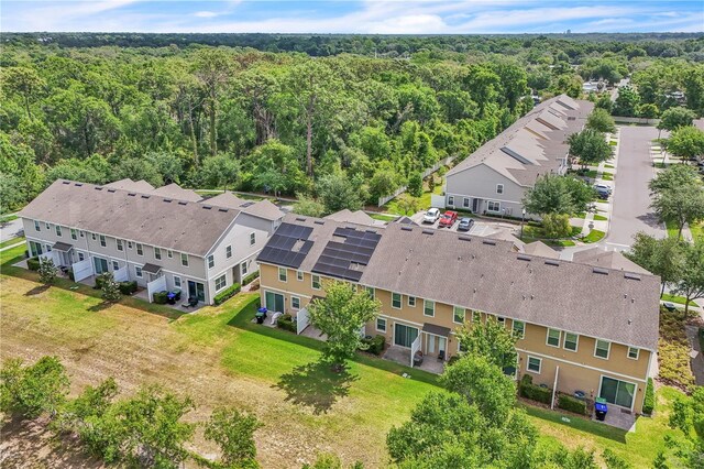 bird's eye view with a view of trees and a residential view