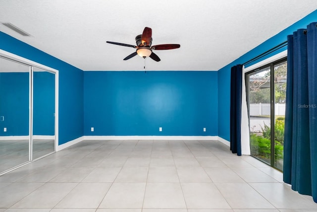 3379 Monika Cir, Orlando, FL 32812 - empty room with a textured ceiling, ceiling fan, visible vents, and baseboards