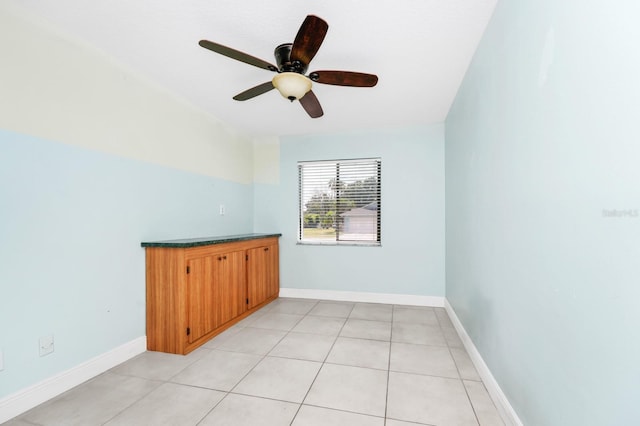 3379 Monika Cir, Orlando, FL 32812 - unfurnished room with baseboards, ceiling fan, and light tile patterned floors