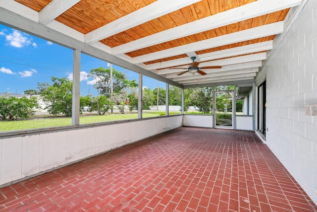 3379 Monika Cir, Orlando, FL 32812 - unfurnished sunroom featuring plenty of natural light, ceiling fan, and beamed ceiling