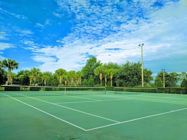 view of sport court with fence and community basketball court