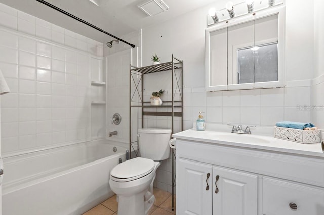 206 Diamond Cv Unit 106, Casselberry, FL 32707 - full bath with washtub / shower combination, tile patterned flooring, vanity, toilet, and tile walls