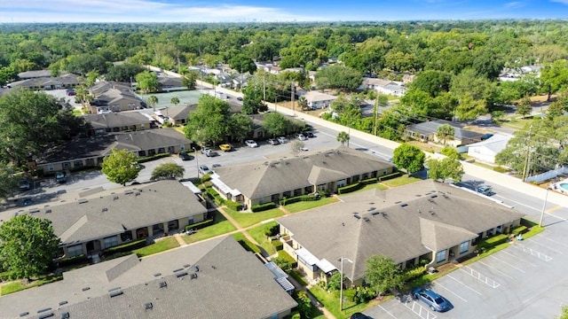 206 Diamond Cv Unit 106, Casselberry, FL 32707 - drone / aerial view with a residential view and a forest view
