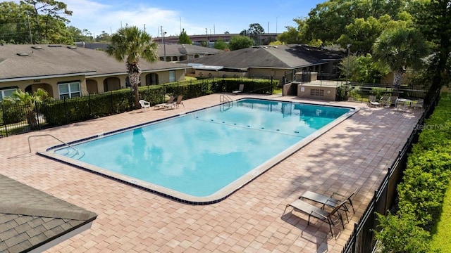 206 Diamond Cv Unit 106, Casselberry, FL 32707 - community pool featuring a patio area and fence