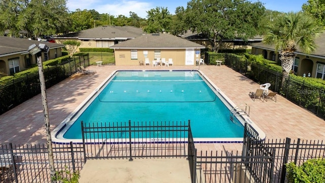 206 Diamond Cv Unit 106, Casselberry, FL 32707 - community pool featuring fence and a patio area
