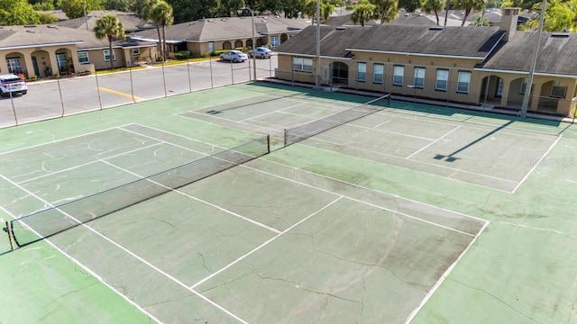 206 Diamond Cv Unit 106, Casselberry, FL 32707 - view of tennis court with fence and a residential view