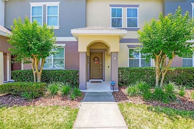 view of front of house featuring stucco siding