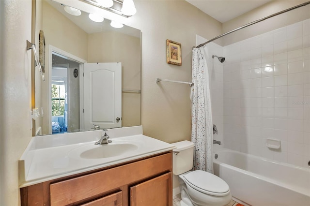 bathroom featuring vanity, toilet, and shower / tub combo