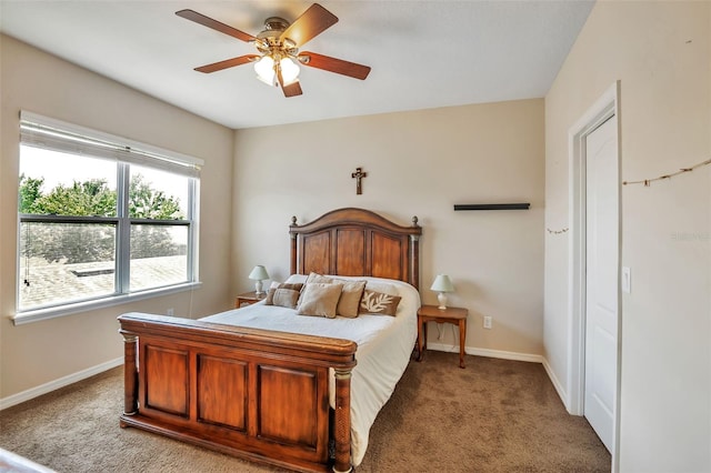bedroom with baseboards, light carpet, and a ceiling fan