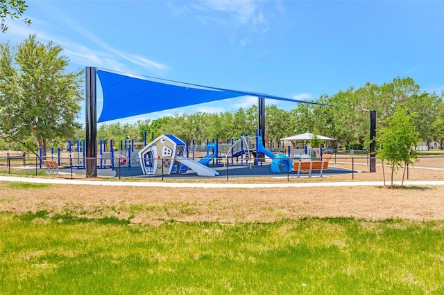 communal playground featuring fence
