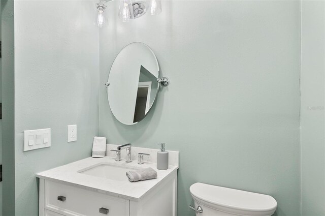 633 Lakehaven Cir, Orlando, FL 32828 - bathroom featuring toilet and vanity