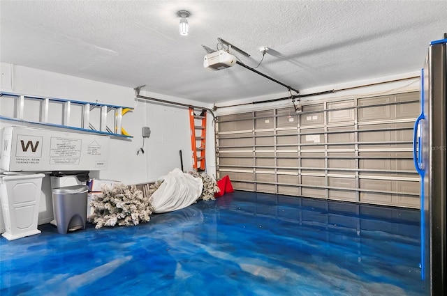 633 Lakehaven Cir, Orlando, FL 32828 - garage featuring a garage door opener and freestanding refrigerator
