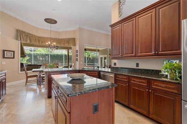 2232 Lake Vilma Dr, Orlando, FL 32835 - kitchen featuring stainless steel dishwasher, pendant lighting, ornamental molding, plenty of natural light, and dark stone countertops