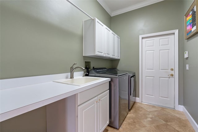 2232 Lake Vilma Dr, Orlando, FL 32835 - laundry room featuring cabinet space, independent washer and dryer, crown molding, a sink, and baseboards
