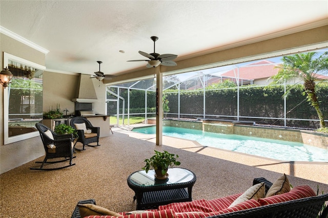 2232 Lake Vilma Dr, Orlando, FL 32835 - outdoor pool featuring glass enclosure, a patio, exterior kitchen, and a ceiling fan