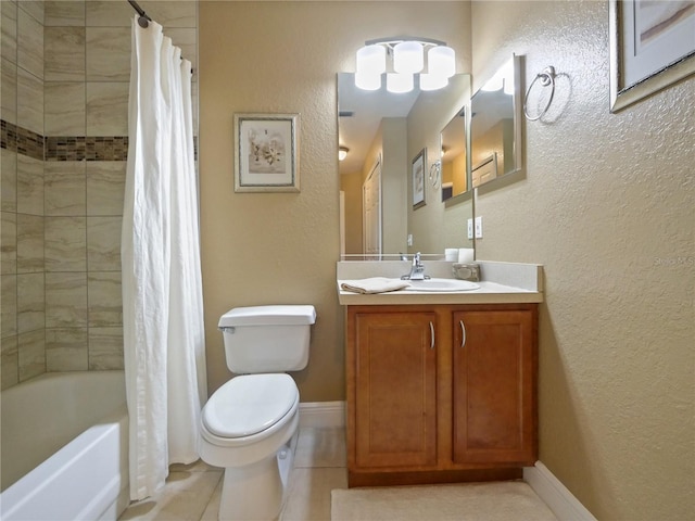 bathroom with tile patterned flooring, shower / bath combo with shower curtain, a textured wall, vanity, and toilet