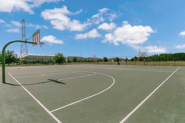 view of sport court with community basketball court and fence