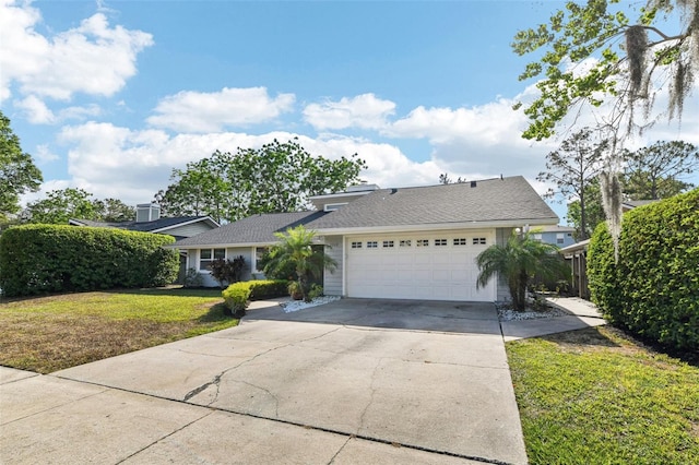 2260 Winslow Cir, Casselberry, FL 32707 - single story home featuring an attached garage, a front lawn, and concrete driveway