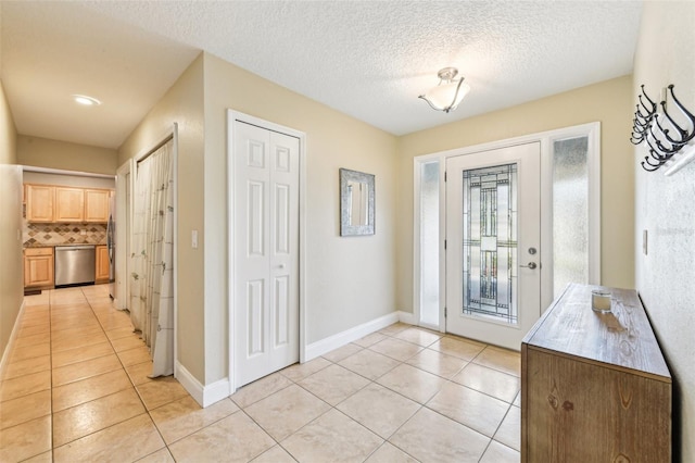2260 Winslow Cir, Casselberry, FL 32707 - interior space featuring baseboards, a textured ceiling, and light tile patterned floors