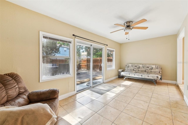 2260 Winslow Cir, Casselberry, FL 32707 - living area featuring ceiling fan, baseboards, and tile patterned flooring