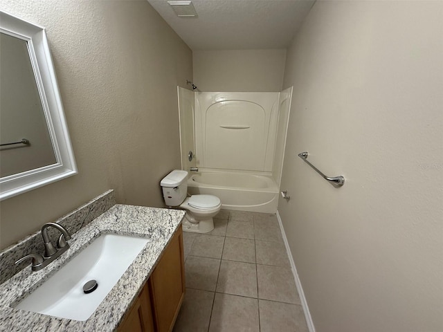 full bathroom with vanity, toilet, tile patterned floors, baseboards, and tub / shower combination
