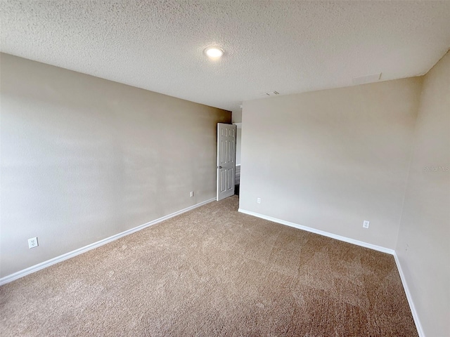 786 Crystal Bay Ln, Orlando, FL 32828 - carpeted spare room featuring a textured ceiling and baseboards