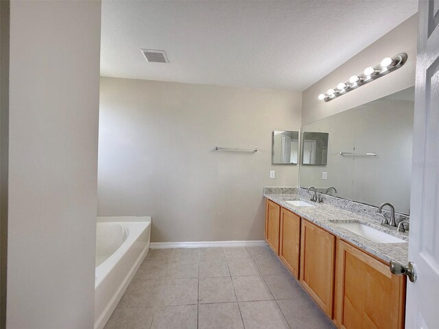 786 Crystal Bay Ln, Orlando, FL 32828 - bathroom with baseboards, visible vents, a sink, and tile patterned flooring
