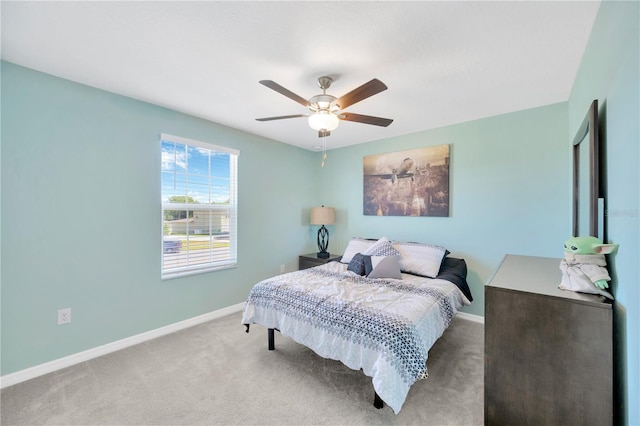 bedroom featuring carpet flooring, baseboards, and ceiling fan