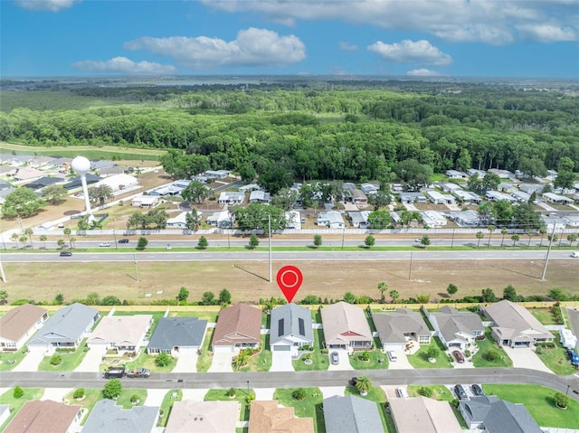 1397 Gatlin Pl, The Villages, FL 32163 - aerial view with a residential view and a view of trees