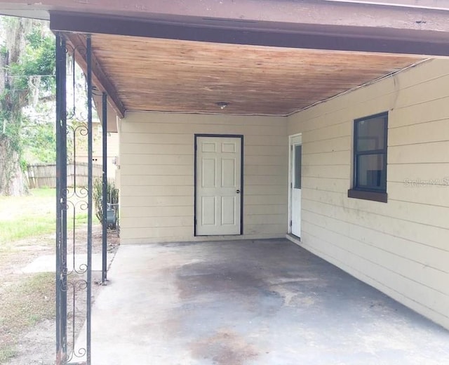3015 Ave I NW, Winter Haven, FL 33881 - view of patio / terrace featuring an attached carport and fence