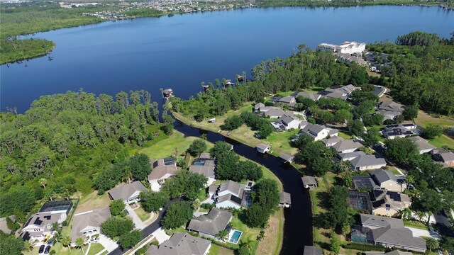 aerial view with a residential view and a water view