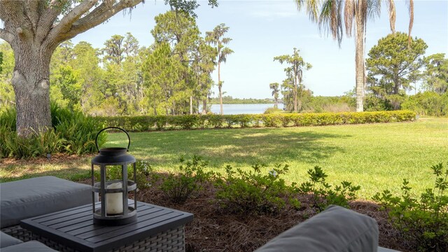 view of yard with a water view