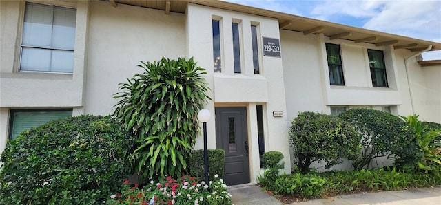view of front of home featuring stucco siding