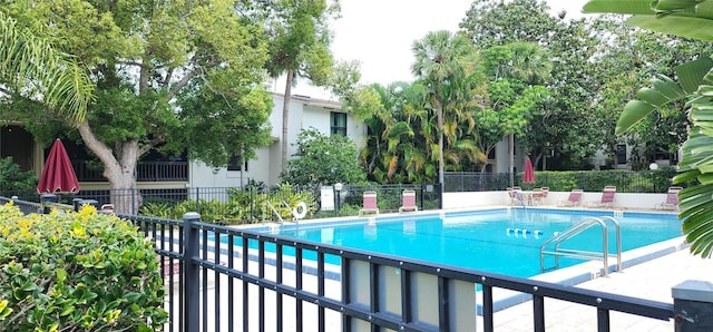 community pool with fence