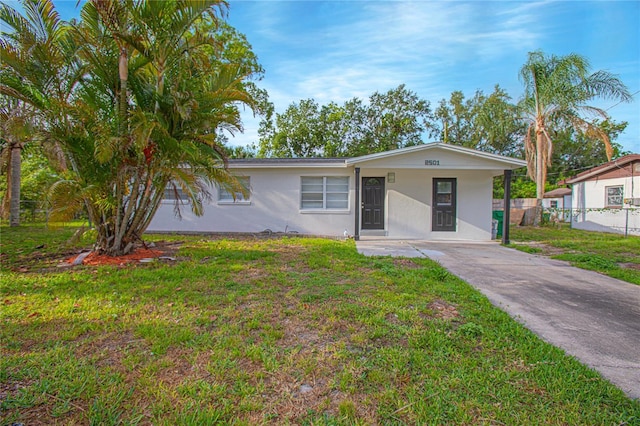 2501 Stratford Dr, Cocoa, FL 32926 - ranch-style house with stucco siding and driveway