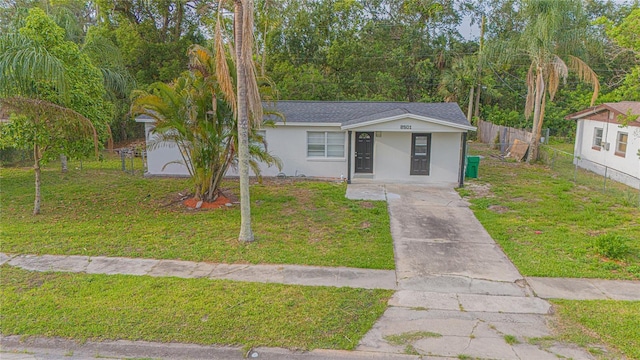 2501 Stratford Dr, Cocoa, FL 32926 - view of front facade with concrete driveway and stucco siding
