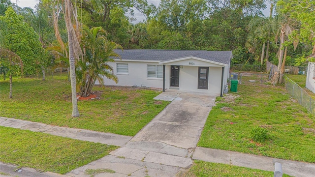 2501 Stratford Dr, Cocoa, FL 32926 - ranch-style house featuring driveway, stucco siding, and roof with shingles