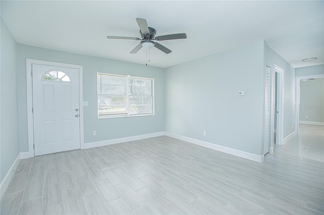 2501 Stratford Dr, Cocoa, FL 32926 - foyer with ceiling fan, baseboards, and light wood-type flooring