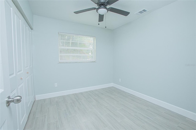 2501 Stratford Dr, Cocoa, FL 32926 - unfurnished bedroom featuring a closet, baseboards, and a ceiling fan